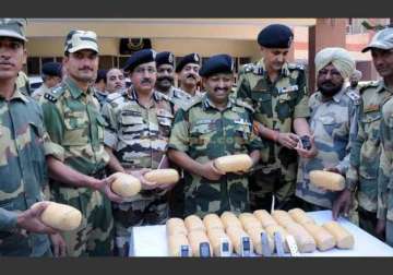 bsf recovers 18 kg heroin arms and ammunition from india pakistan border in gurdaspur