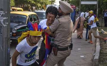 tibetans stage protest outside taj palace over xi s india visit