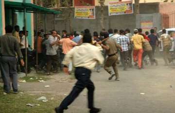 communal clash in ahmedabad police fire in air