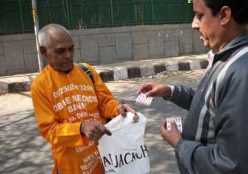 photo essay 79 year old medicine baba collects medicine from rich and gives to poor