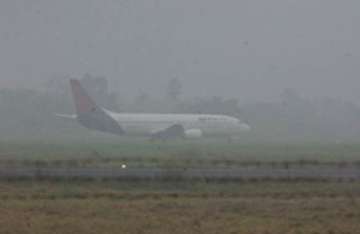 dense fog disrupts flight operations in delhi