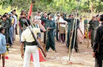 maoists fire at four crpf camps in dantewada