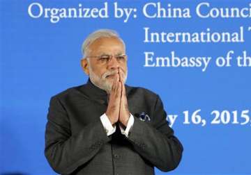 vhp leader slams narendra modi over china trip