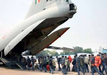 kashmir floods thousands throng iaf base for safe passage out of valley