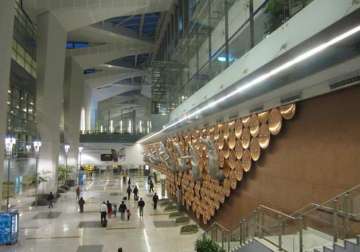 7 held at indira gandhi international airport with 182 iphones