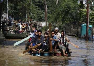 over 130 000 rescued in flood ravaged kashmir pm appeals for donations