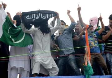youths wave pakistan is flags clashes with police