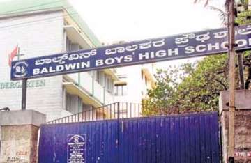 bangalore teacher throws duster boy loses teeth