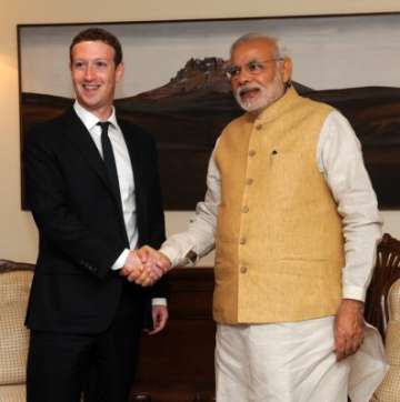 narendra modi tells mark zuckerberg think how social media can stop terror