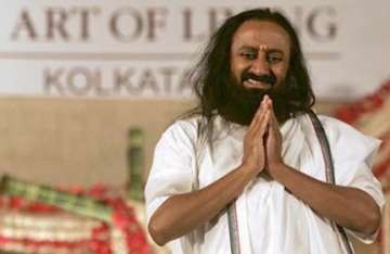 sri sri ravishankar escapes unhurt as gunman fires at convoy