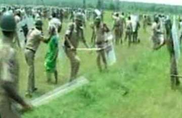 two killed as farmers clash with police in ap