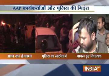 police lathicharge aap workers in delhi registers fir against two mlas for inciting mob