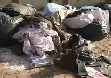 crpf orders inquiry into blood stained uniforms found in dump
