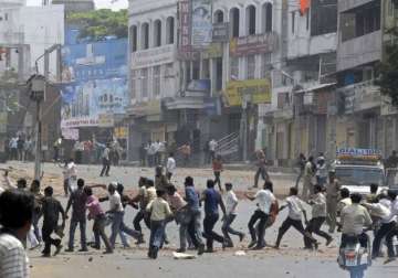clashes in kanpur over torn religious poster