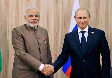 putin arrives in india modi looks to productive visit