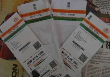 maharashtra electoral office to link voter ids with aadhaar cards