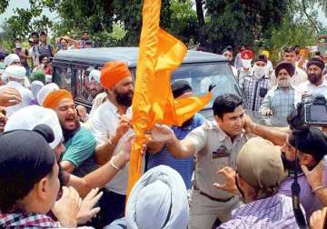 sikh protestors clash with police 15 injured