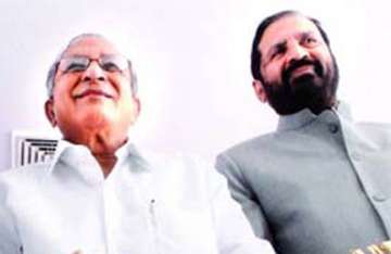 kalmadi meets reddy ahead of gom meeting on monday