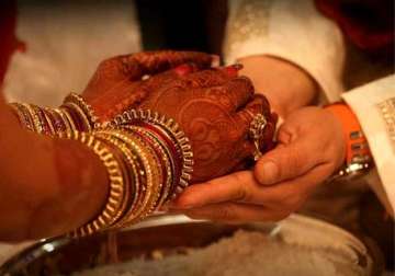 up government to award rs 50 000 to encourage intercaste marriage