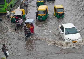 heavy rains lash delhi waterlogging traffic woes for people