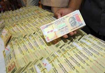 switzerland commits to cooperate in india s black money fight