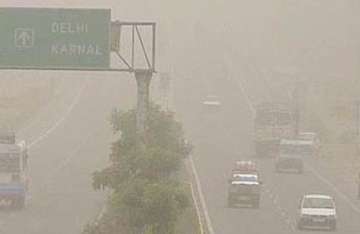 dust haze engulfs delhi temperatures climb to 34.7 c