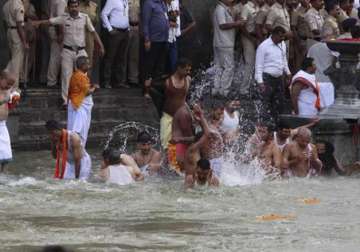 kumbh mela thousands take holy dip during first shahi snan