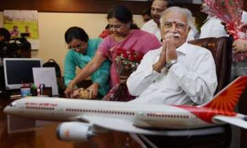 dummy grenade on plane civil aviation minister contradicts ai