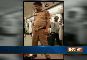 video clip showing drunk cop in delhi metro goes viral