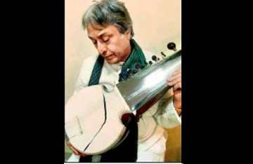 air india breaks ustad amjad ali s sarod