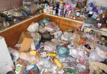 kolkata man found stashing garbage in house
