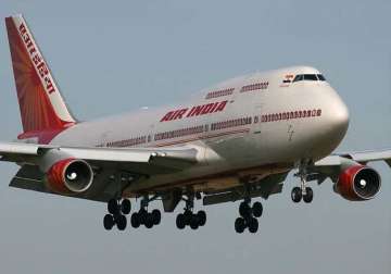 air india flight catches fire emergency landing at delhi airport