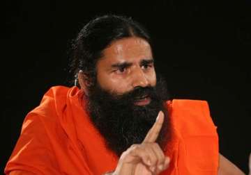 modi should ban cow slaughter nationwide baba ramdev