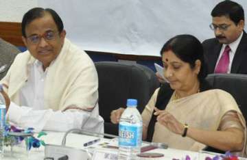 chidambaram sushma in a verbal duel on cvc