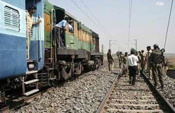 militants trigger blast derail train in assam