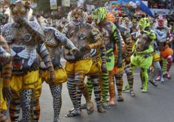 photo feature beautiful tiger dance procession celebrating onam
