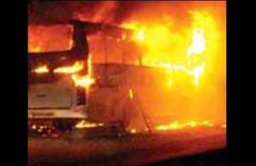 30 killed as bus overturns catches fire in karnataka