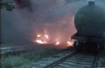 goods train catches fire as maoists blast rail line