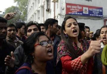 students protest outside police station over woman s murder