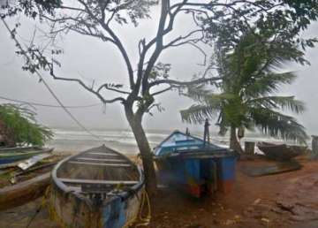 cyclone hudhud makes landfall in andhra pradesh coast two dead