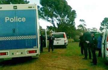 partially burnt body of indian found in new south wales