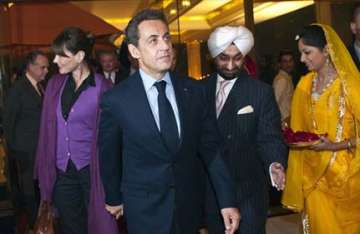 pm hosts private dinner for sarkozy couple