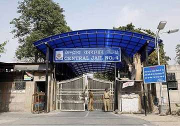 report sought from tihar jail as two escape