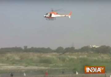 delhi police uses choppers to monitor durga puja immersions watch video