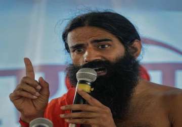 ramdev defends sushma but says lalit involved in shady deals