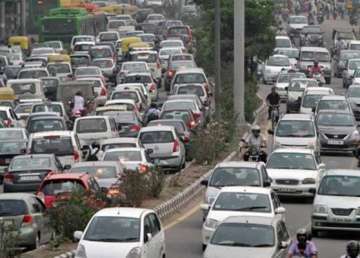 1 out of 7 delhiites owns a car 1 of three a bike report