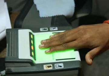 to improve pds maharashtra government mulls ration card aadhaar link up