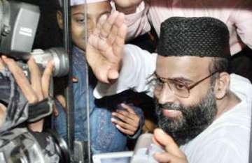 madani stands isolated
