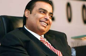 mukesh ambani tops forbes list of india s richest