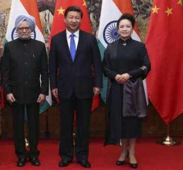 sonia gandhi manmohan singh meet chinese president jinping
